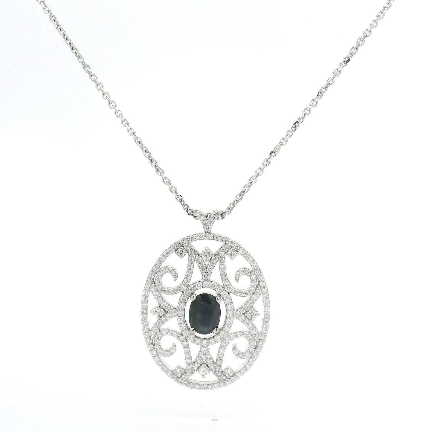 18k White Gold Oval Pendant With A Oval Sapphire In The Center