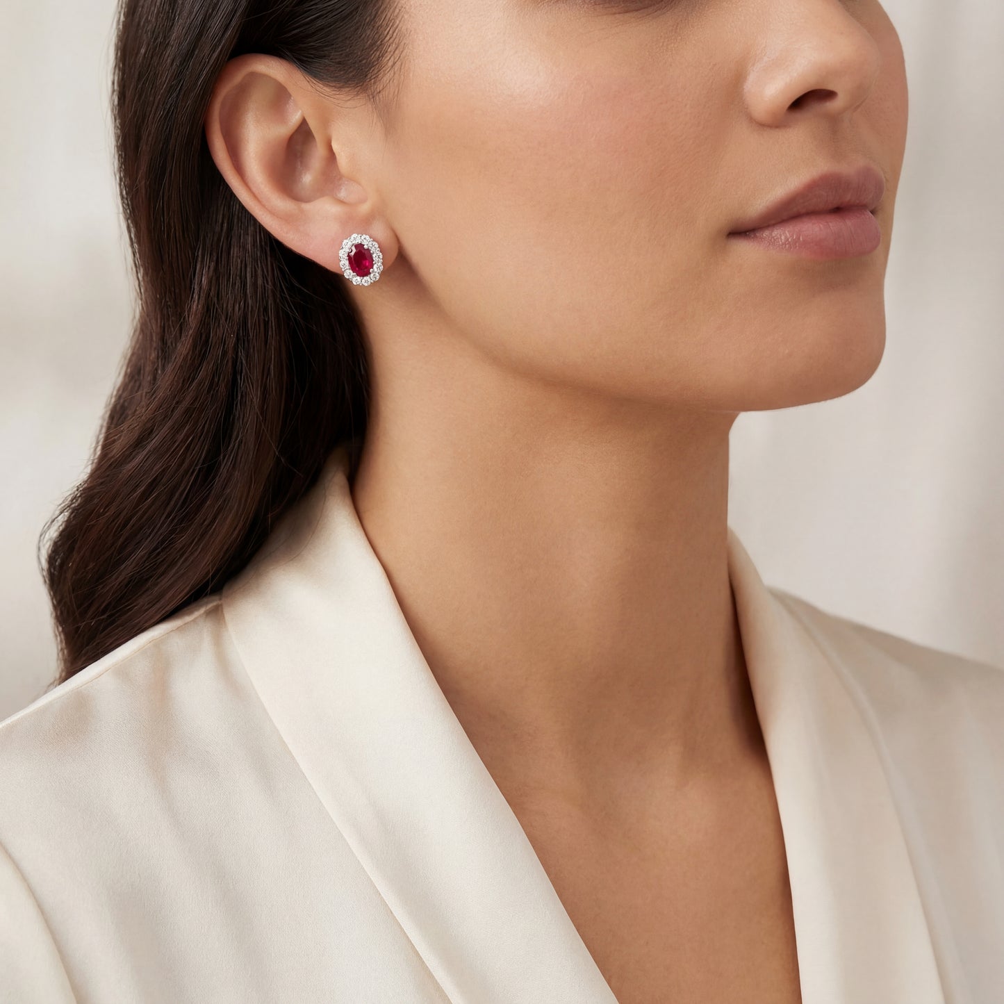 18k White Gold Ruby and Diamond Halo Studs.