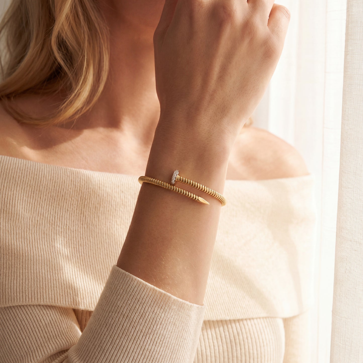 Yellow gold nail bracelet