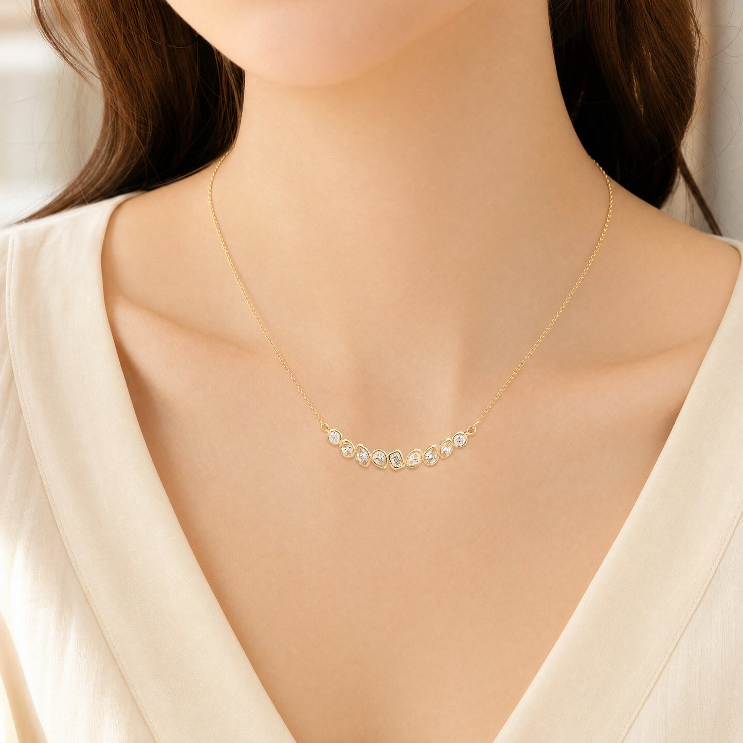Yellow gold multi shape diamond necklace.