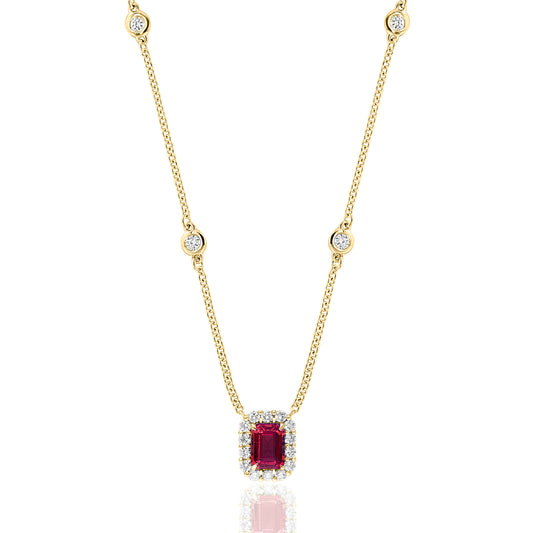 18K yellow gold emerald-cut ruby with a diamond halo on a diamond bezel chain.