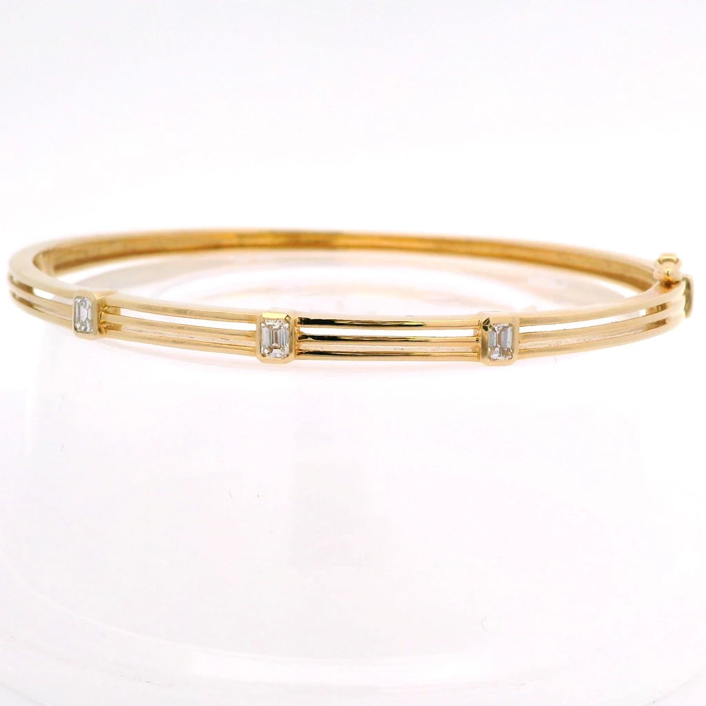 14K Yellow Gold Bangle With Emerald Cut Diamonds
