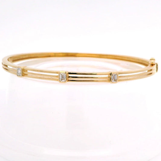 14K Yellow Gold Bangle With Emerald Cut Diamonds