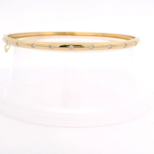 14K Yellow Gold Bangle With Burnish Set Diamonds